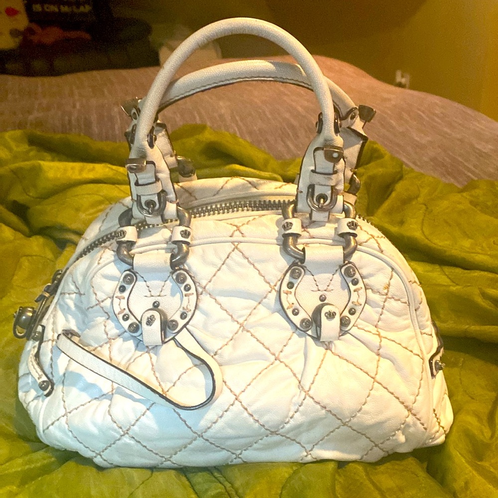 Juicy couture white and silver bag. In great condition.